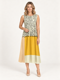 Leah – vestido midi colorblock de lunares, portada de catálogo premium con modelo rubia