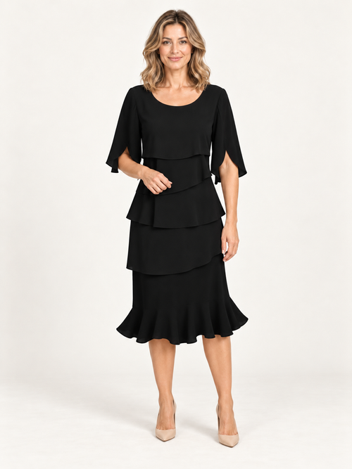 Patricia | Vestido negro con modelo rubia - Ana Ruiz