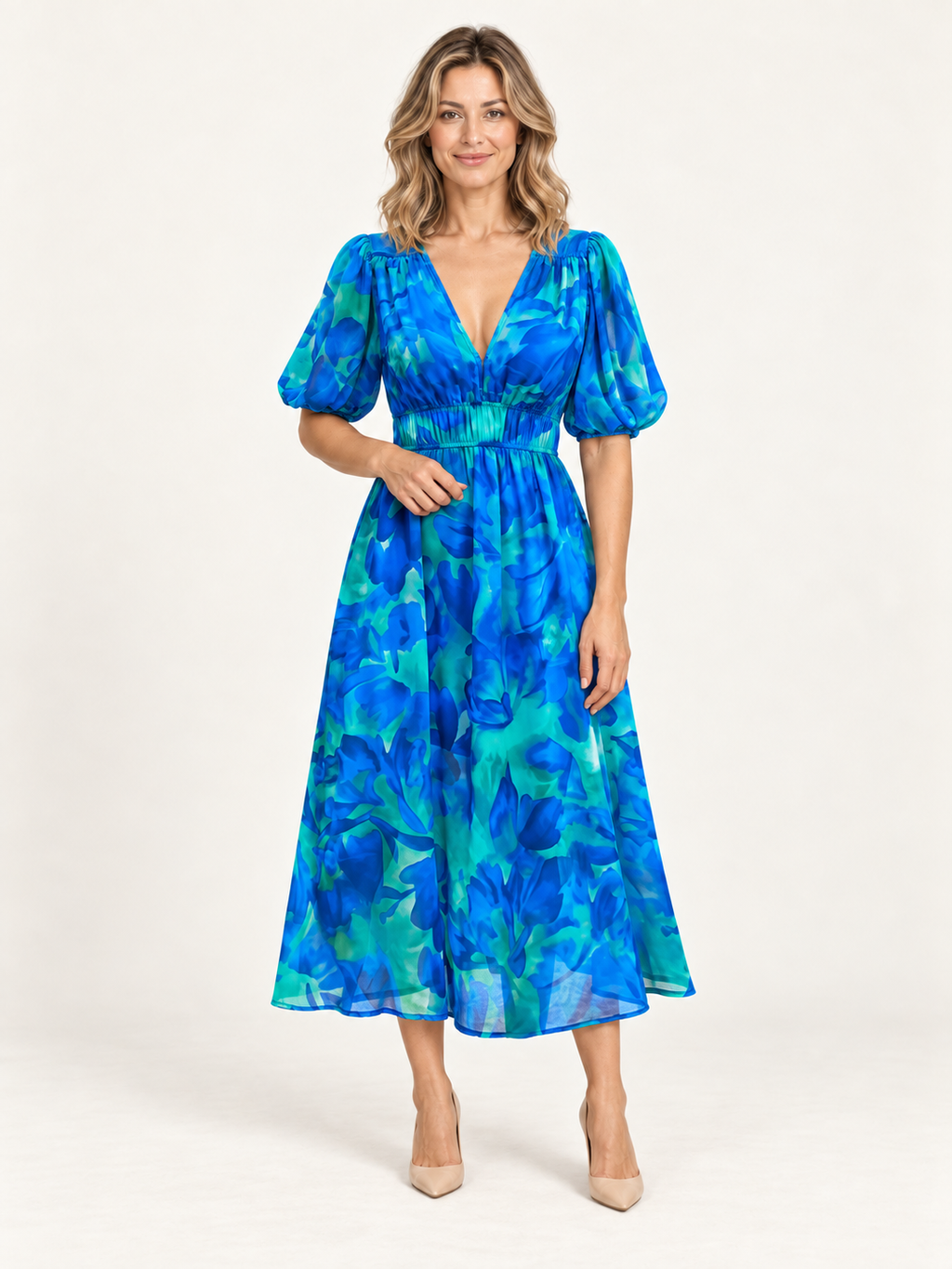 Tarifa – vestido floral azul, portada premium con modelo rubia