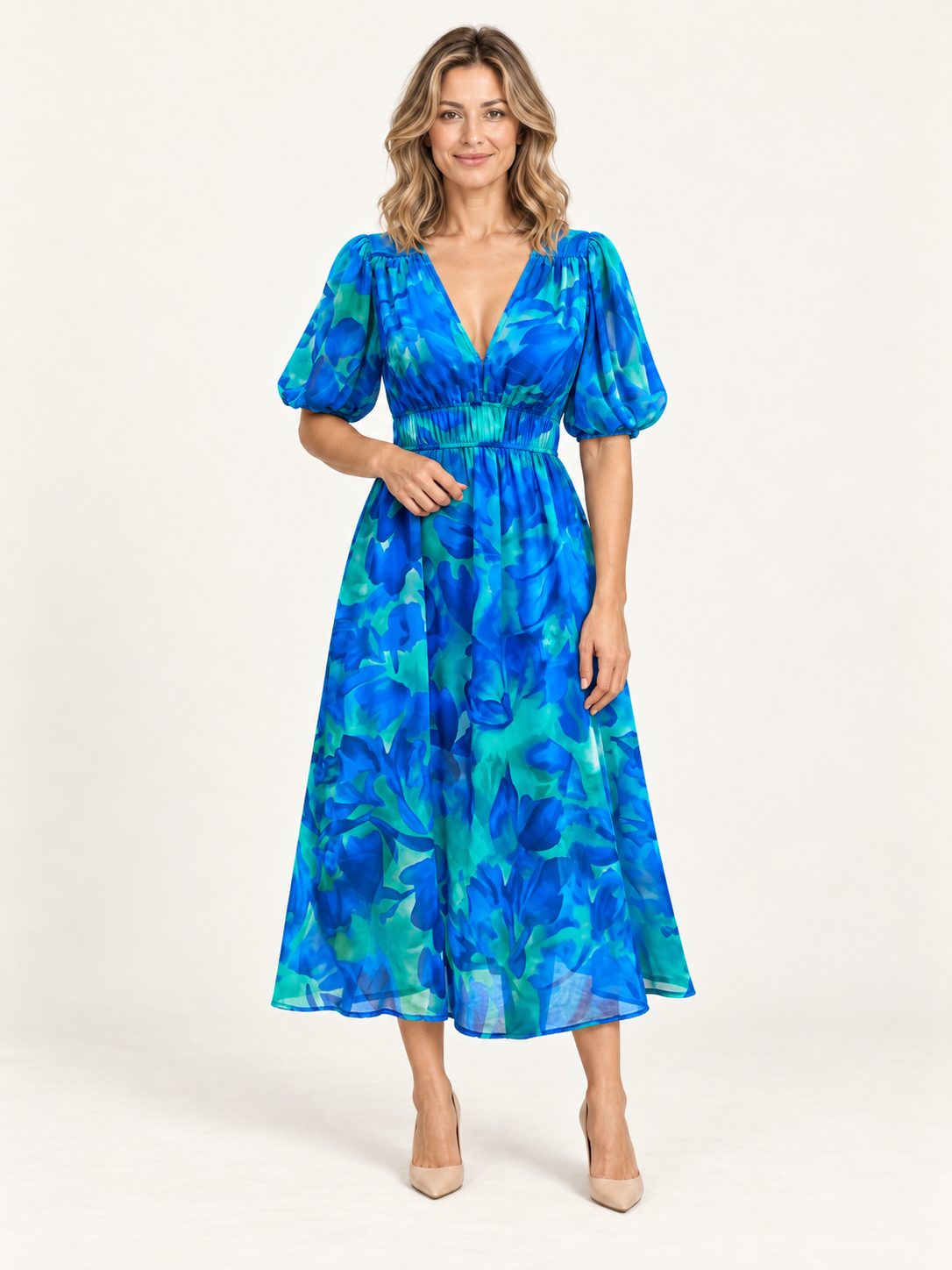 Tarifa – vestido floral azul, portada premium con modelo rubia